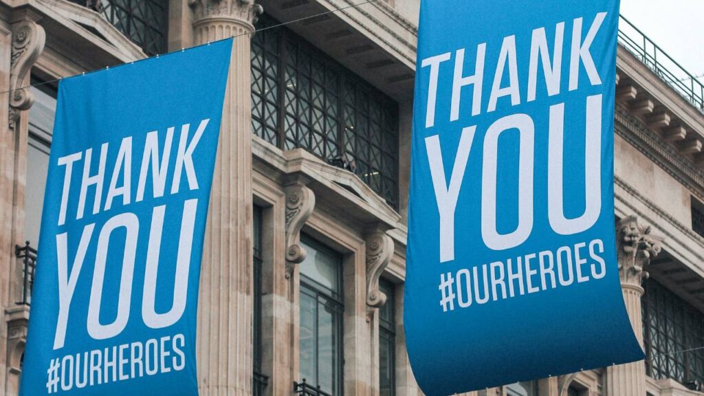 Two blue banners with "Thank You" written on them