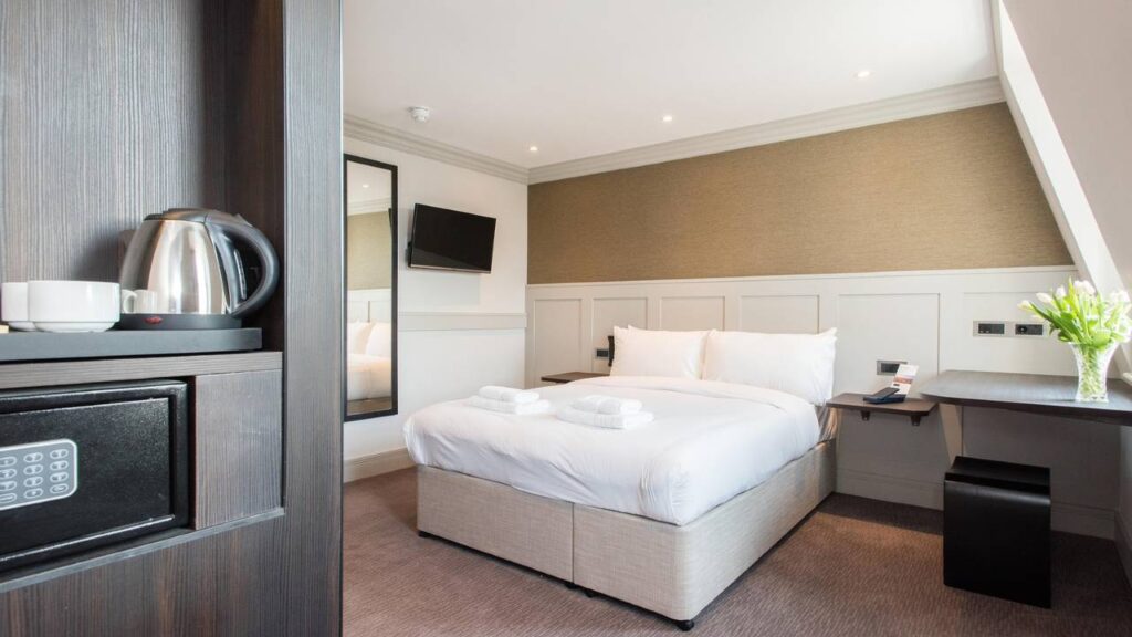 A photo of a room in a modern hotel, featuring contemporary design of the furnishings